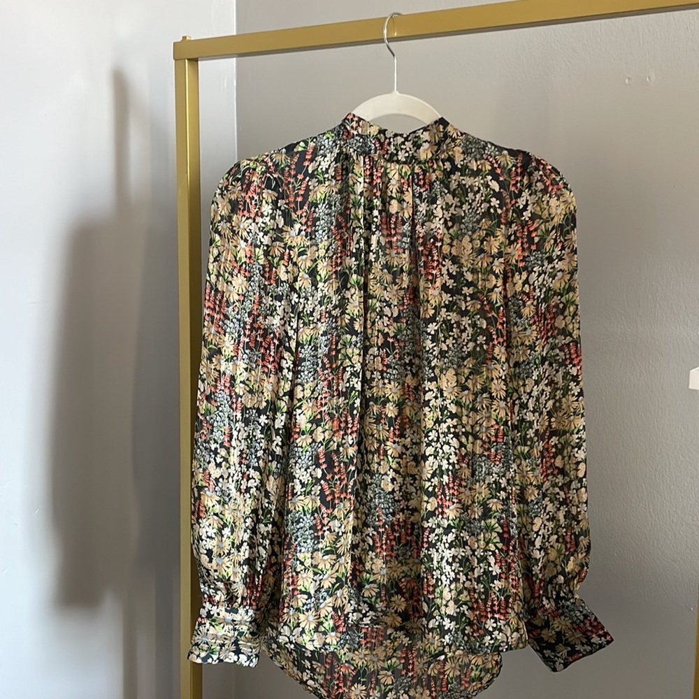 H&M long sleeve black and floral blouse with a mock neck and gold details